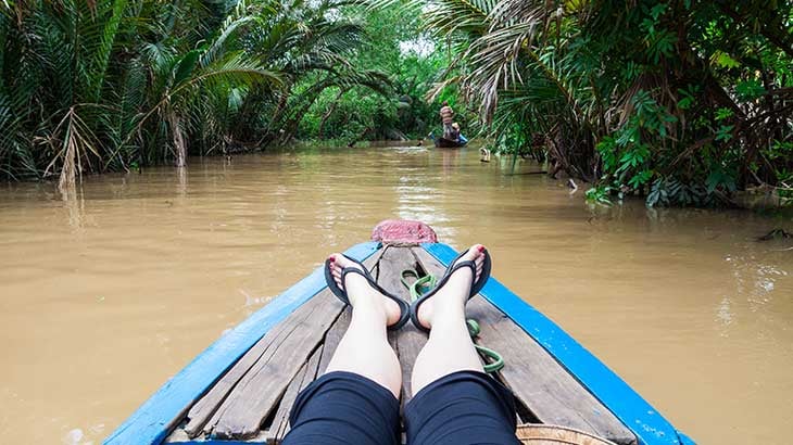 Woman relaxing on the Mekong 