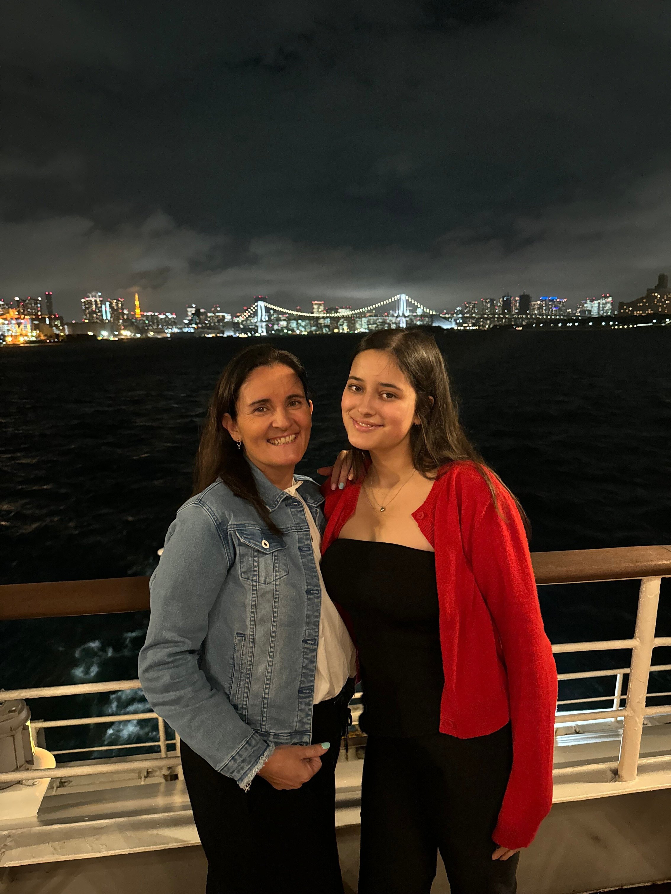 Ava and Mercedes on a dinner cruise in the Tokyo Bay with the skyline in the background_On tour with Wendy Wu Tours. Photo supplied by Mercedes Maguire
