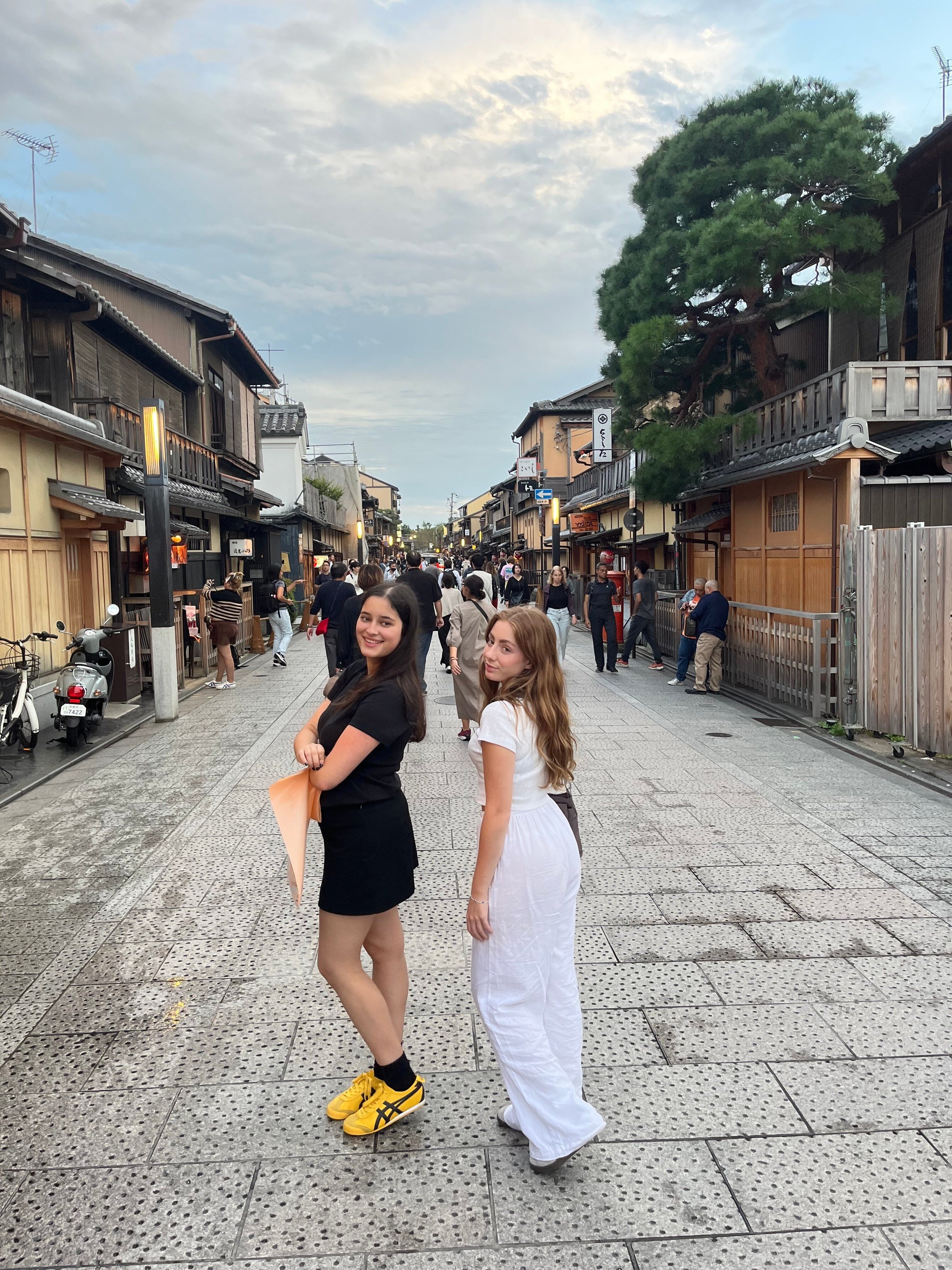 Ava and new friend Mikayla n the streets of Kyoto_On tour with Wendy Wu Tours. Photo supplied by Mercedes Maguire